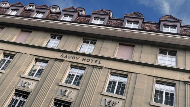 Exterior facades with Savoy Hotel logo